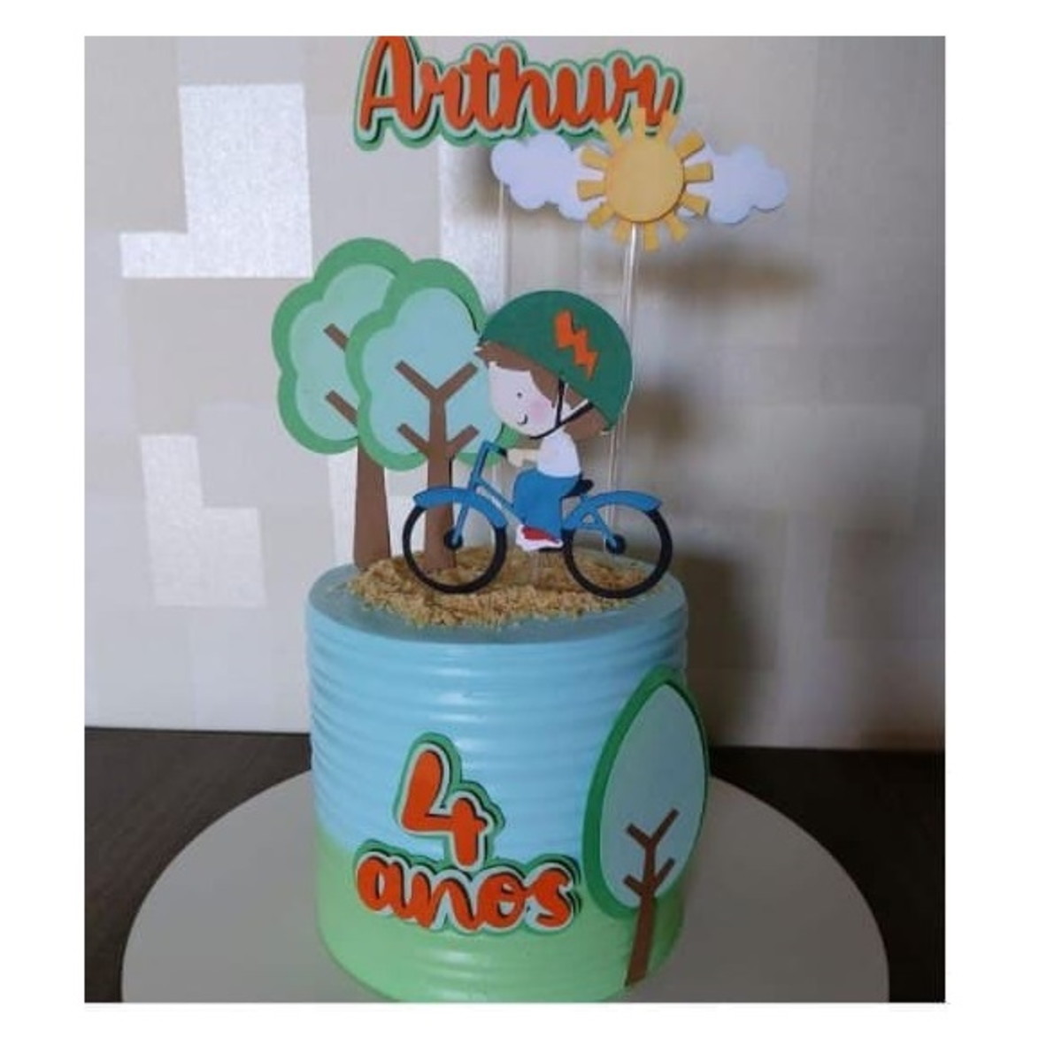 arquivo Topo de bolo menino bicicleta